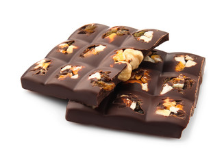 Tasty milk chocolate with candied fruit and nuts on white background