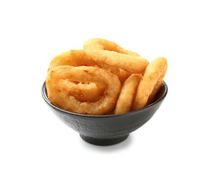 Bowl with tasty onion rings on white background