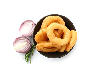 Bowl with tasty onion rings on white background