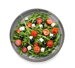 Plate with healthy salad on white background