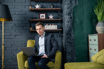 man reading a book in library