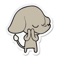 sticker of a cartoon smiling elephant