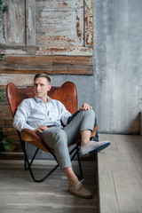 man sitting on a bench in park