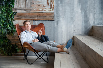 senior couple sitting on a bench in park
