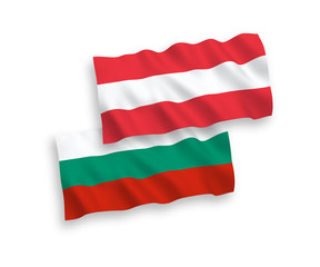 National vector fabric wave flags of Austria and Bulgaria isolated on white background. 1 to 2 proportion.