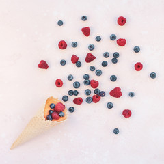 Summer composition berries ice cream waffle cone