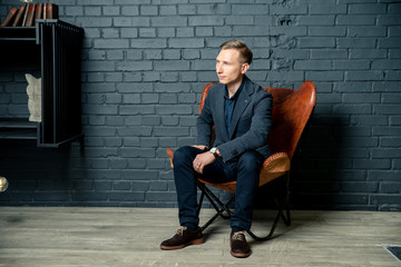 man sitting on chair