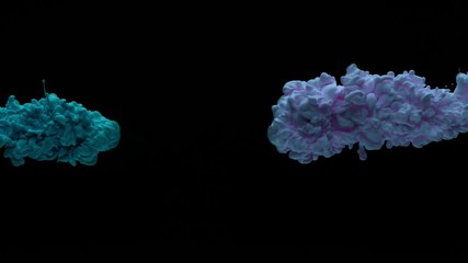 Super slowmotion shot of color inks in water. Shot with high speed camera at 4K.