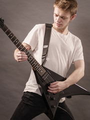Man playing on electric guitar