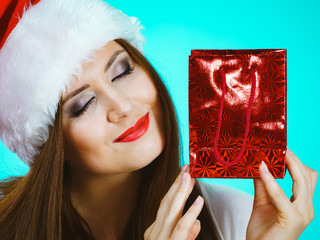 Happy Christmas woman receiving gifts