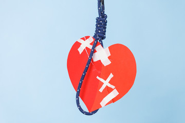 Obraz premium Heart on suicide rope