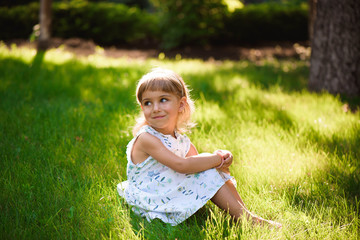 Fototapeta premium Portrait of a beautiful young little girl