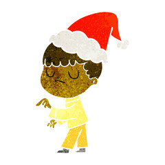 retro cartoon of a grumpy boy wearing santa hat