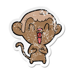 distressed sticker of a cartoon laughing monkey