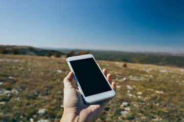woman using mobile smart phone outdoor
