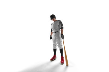 Baseball player isolated on white.