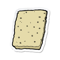 sticker of a cartoon biscuit