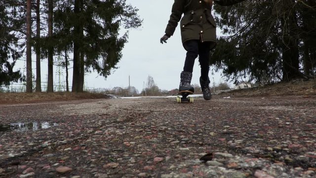 Little girl Learn the Basics of Skateboarding