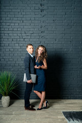 young couple sitting on stairs