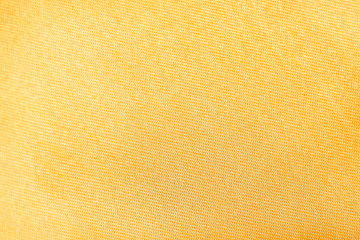 Gold yellow fabric texture for colorful bright background