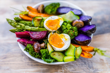 A healthy and balanced salad made of colorful vegetables. Buddha bowl.