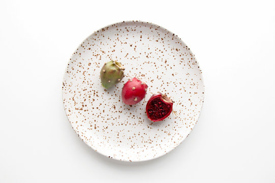 Prickly Pear Fruit On A Ceramic Plate On A White Background, Creative Flat Lay Food Concept, Prickly Pear Cactus, Opuntia Ficus-indica