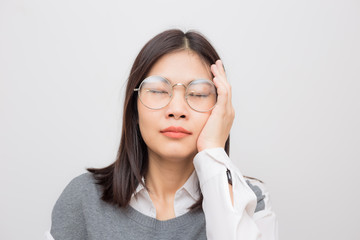 Portrait of unhappy headache asian eye glasses women  feeling strees