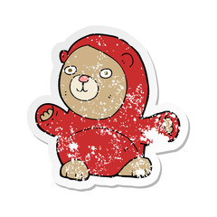 retro distressed sticker of a cartoon teddy bear