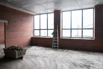Stack of red clay brick on construction site