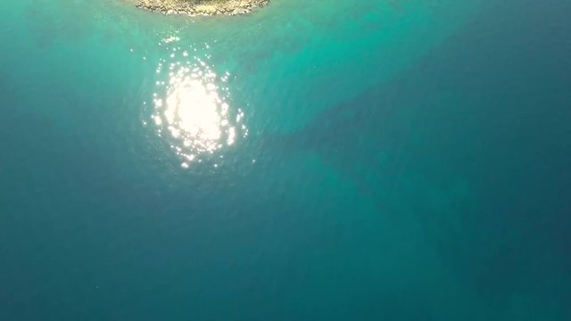 Aerial view of crystal clear water off the coastline inisland Krk, Croatia
