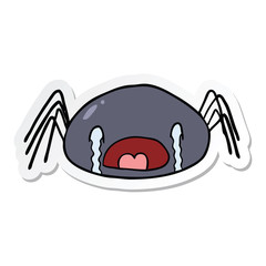 sticker of a cartoon crying spider