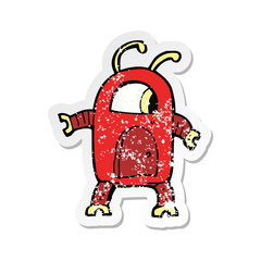 retro distressed sticker of a cartoon alien robot