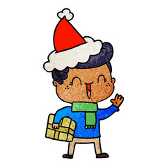 textured cartoon of a laughing boy wearing santa hat