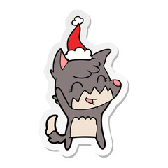 happy sticker cartoon of a fox wearing santa hat