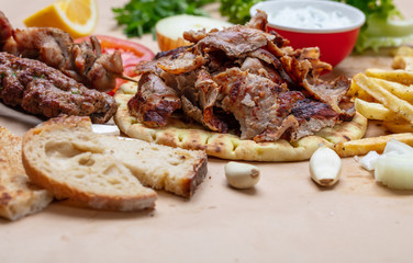 Shawarma, gyros pita. Traditional turkish, greek meat food on pita bread