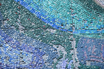 Background created with a blue tiled wall .