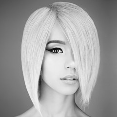 Lovely asian woman with blonde short hair