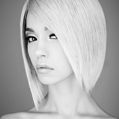 Lovely asian woman with blonde short hair