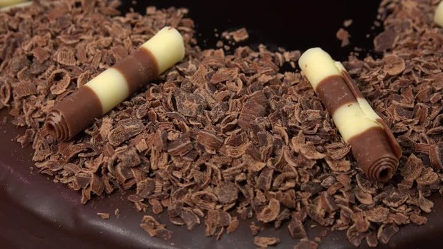 Closeup on the top of a decorated chocolate cake