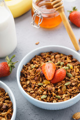 Homemade healthy oat granola with fresh berries.
