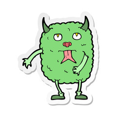 sticker of a funny cartoon monster