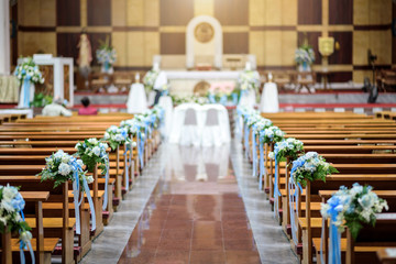 Fototapeta na wymiar Christian Church interior with wedding flower decoration