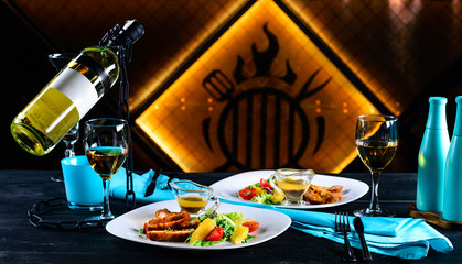 appetizer and wine for a romantic evening in a restaurant