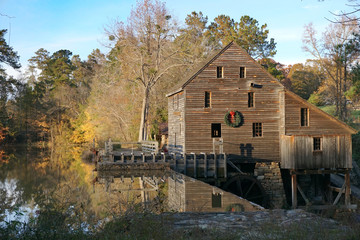 Old mill with holiday wreath. Yates Mill in Raleigh, North Carolina