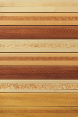 Wooden skirting boards on the ceiling. Ornaments and drawings on the wooden surface. Building...