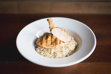 grilled chicken on bed of risotto