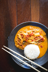 Thai curry with rice and chop sticks