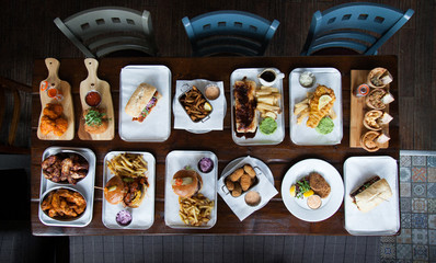 selection of dishes on table in restaurant © Dan