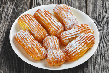 close-up of delicious Homemade Eclairs on a plate