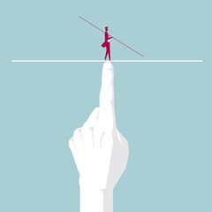 Businessman walking tightrope on the finger. Isolated on blue background.